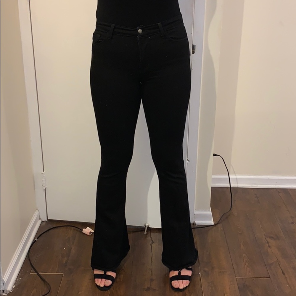 J Brand mid rise wide leg jean in black.